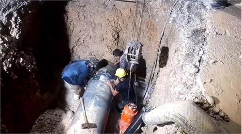 مهار شکستگی خط لوله ۶۰۰ پلی‌اتیلن در خیابان اصلی دزفول